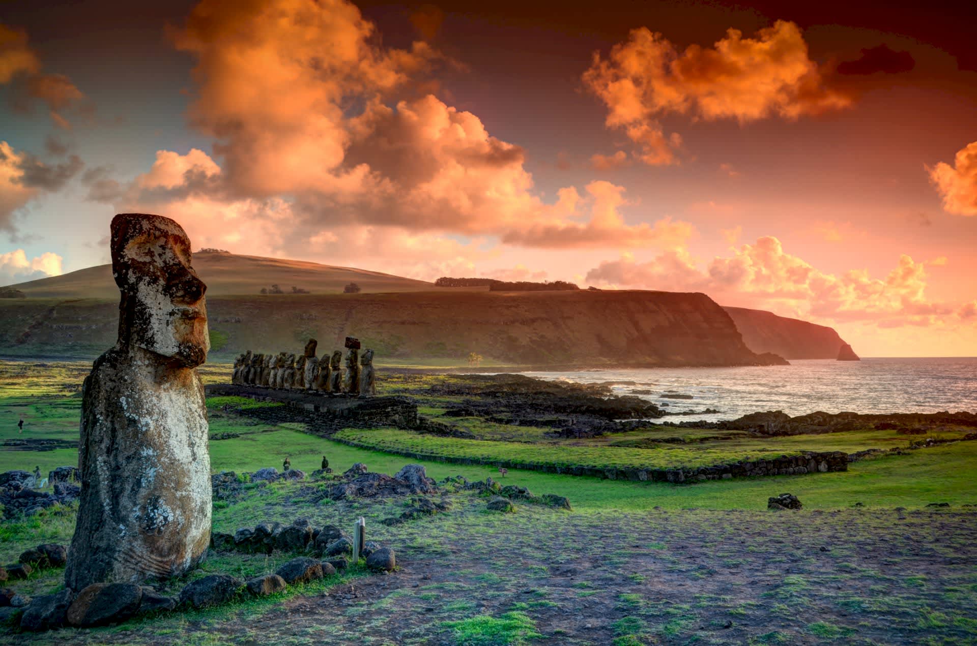 EASTER ISLAND The Riddle of the Pacific Moai against the cliff