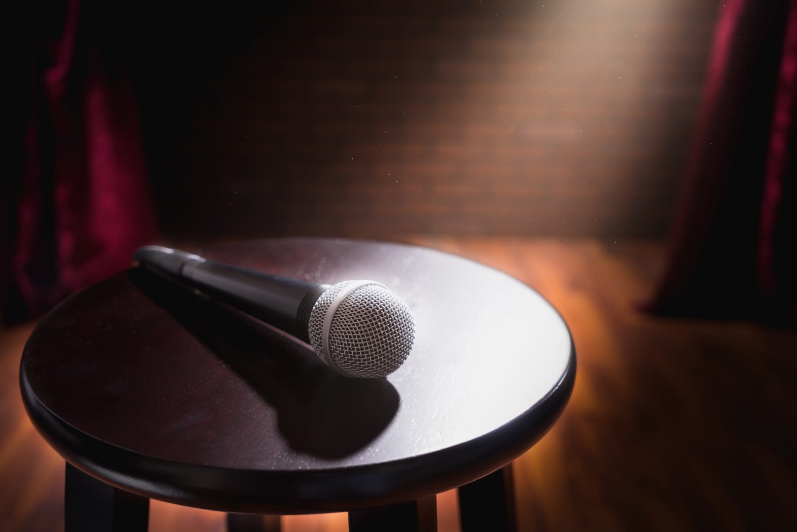 Different Times Stand Up Comedy Stool and Microphone