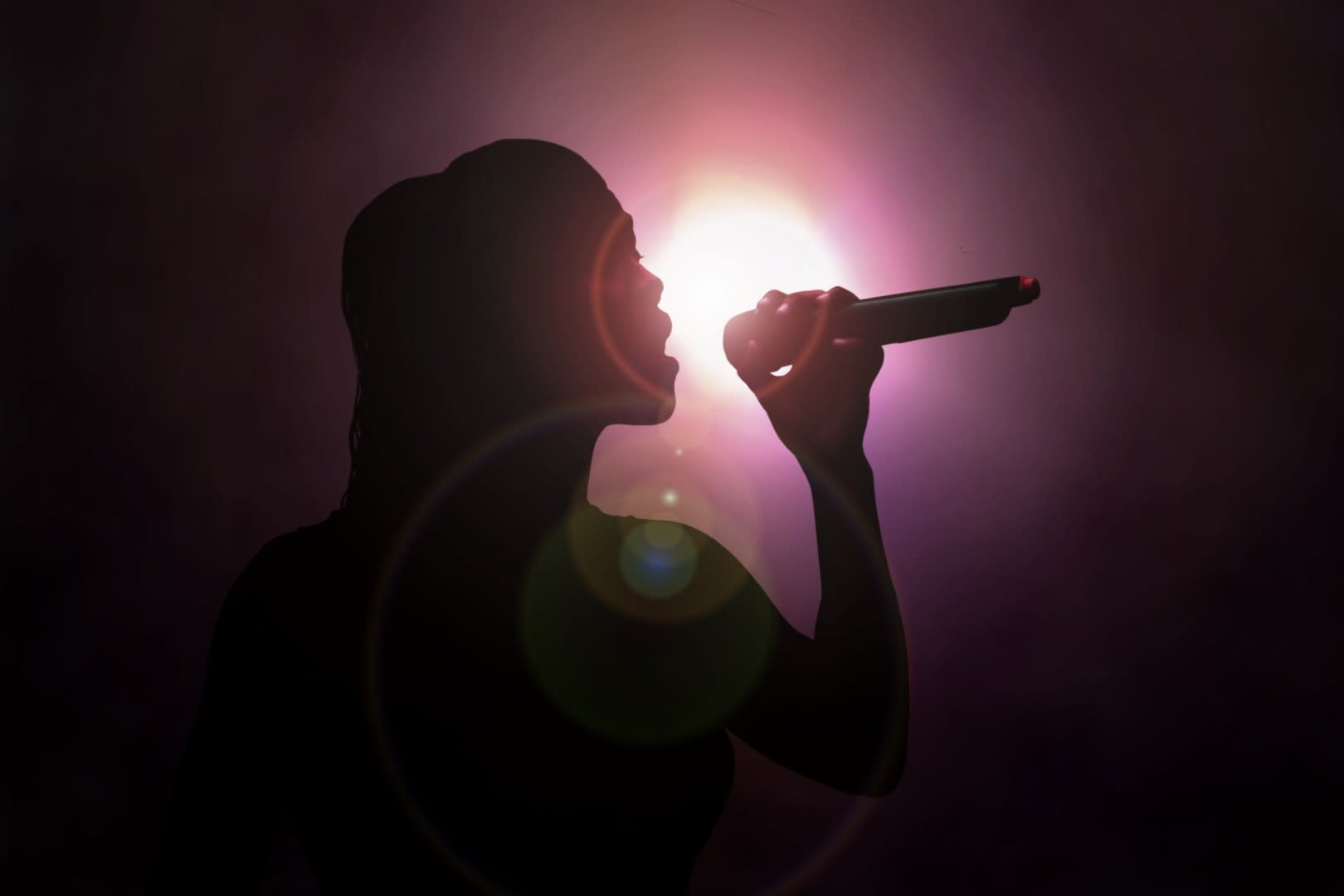 Alexandra Burke Woman Sings Under Spotlight