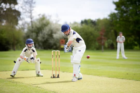 Beachborough  pupils playing cricket