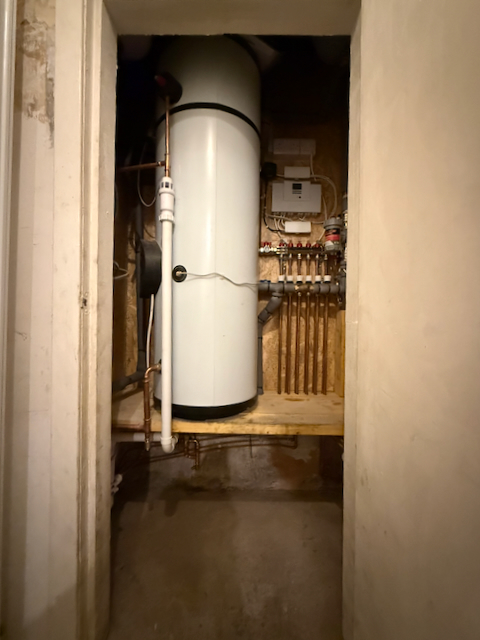 A neatly organised manifold cupboard