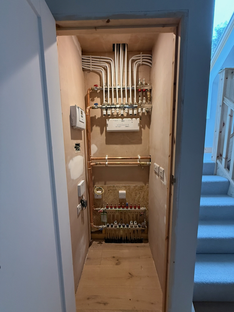 A copper pipework array laid out in neat parallel runs