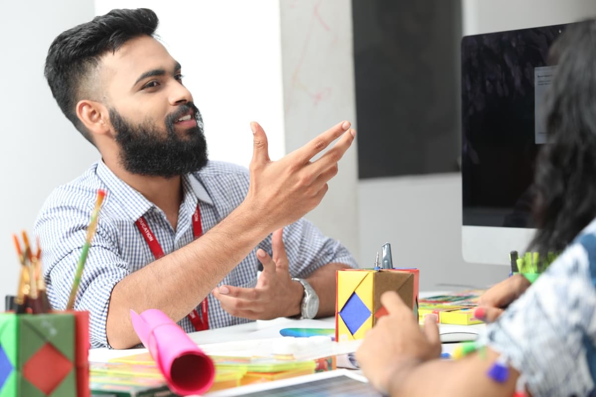 Office manager talking employee
