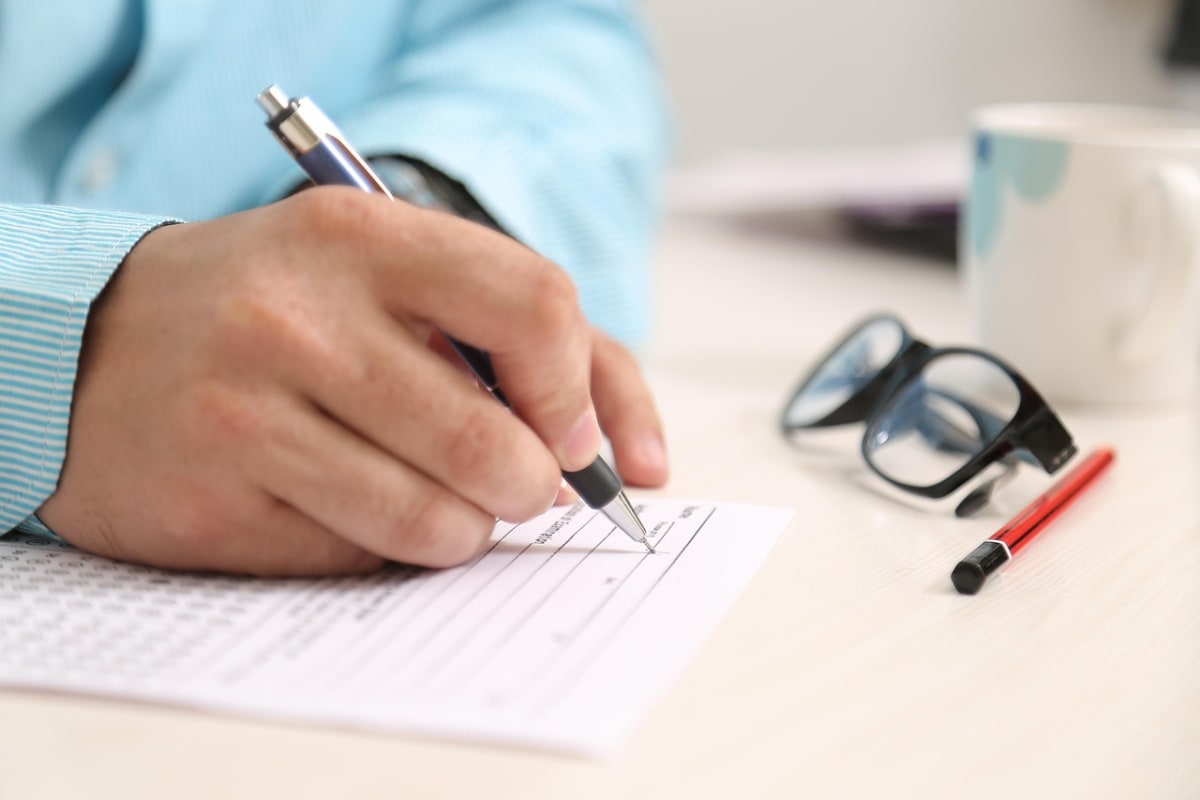 Nigerian woman filling form office