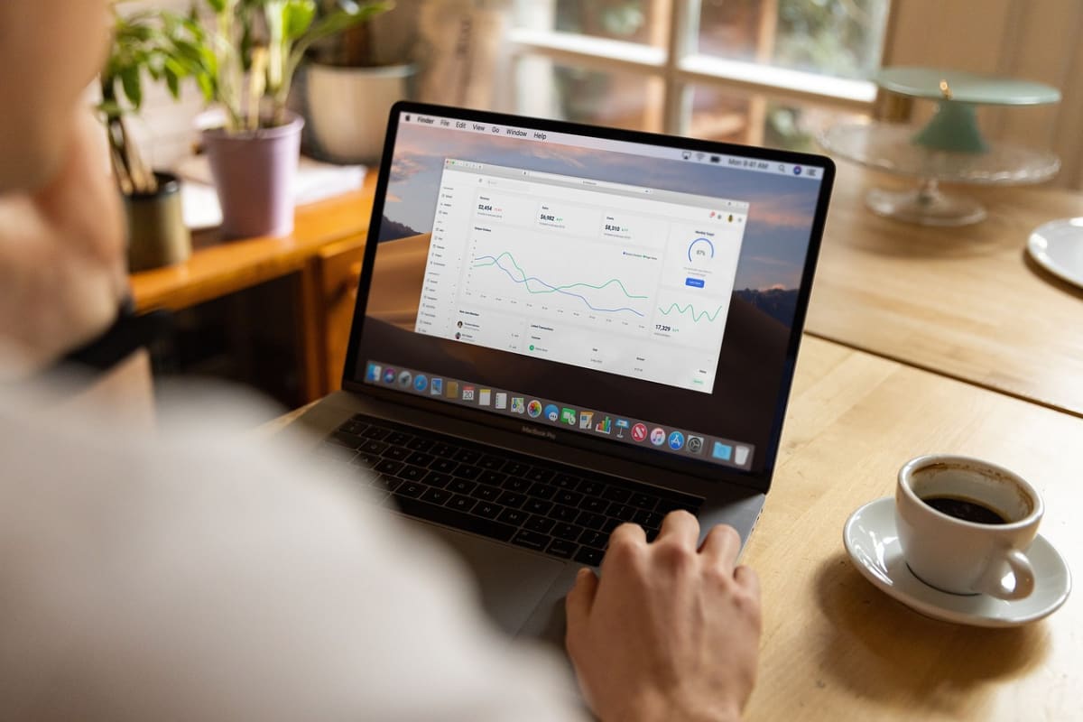 Freelancer laptop invoice desk