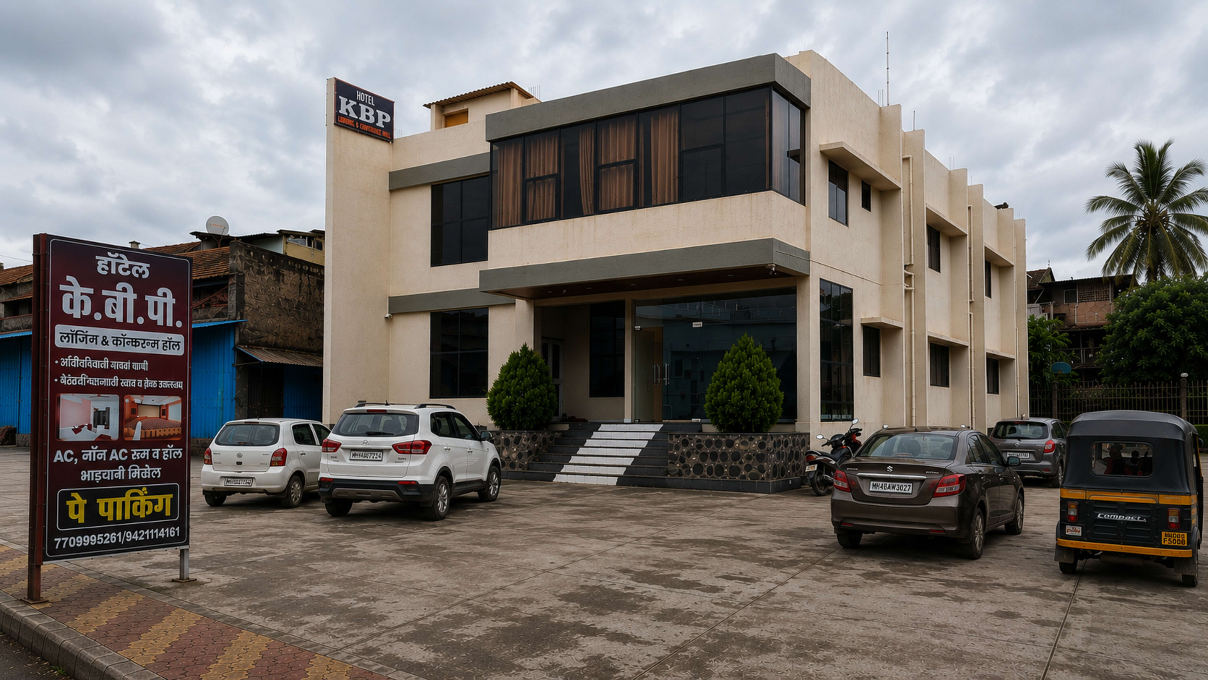 Hotel KBP building exterior in Admapur, near Shri Balumama Temple