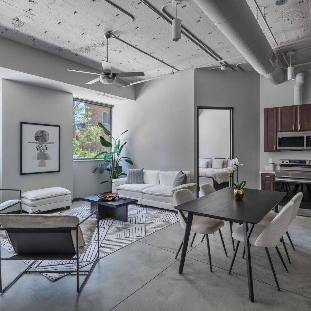 Apartment kitchen and living room at The Delco in Dayton, Ohio