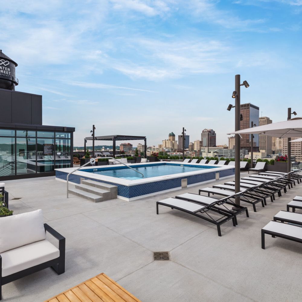 Luxurious roof-top swimming pool with lounge beds at The Delco in Dayton, Ohio