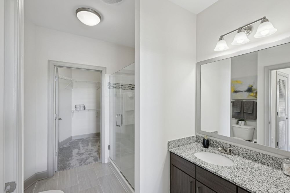 Bathroom with a large mirror at One Metrocenter in Nashville, Tennessee