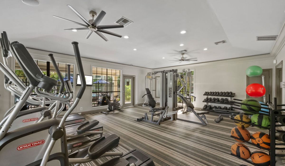 Well equipped fitness center at Mizner Court in Boca Raton Florida