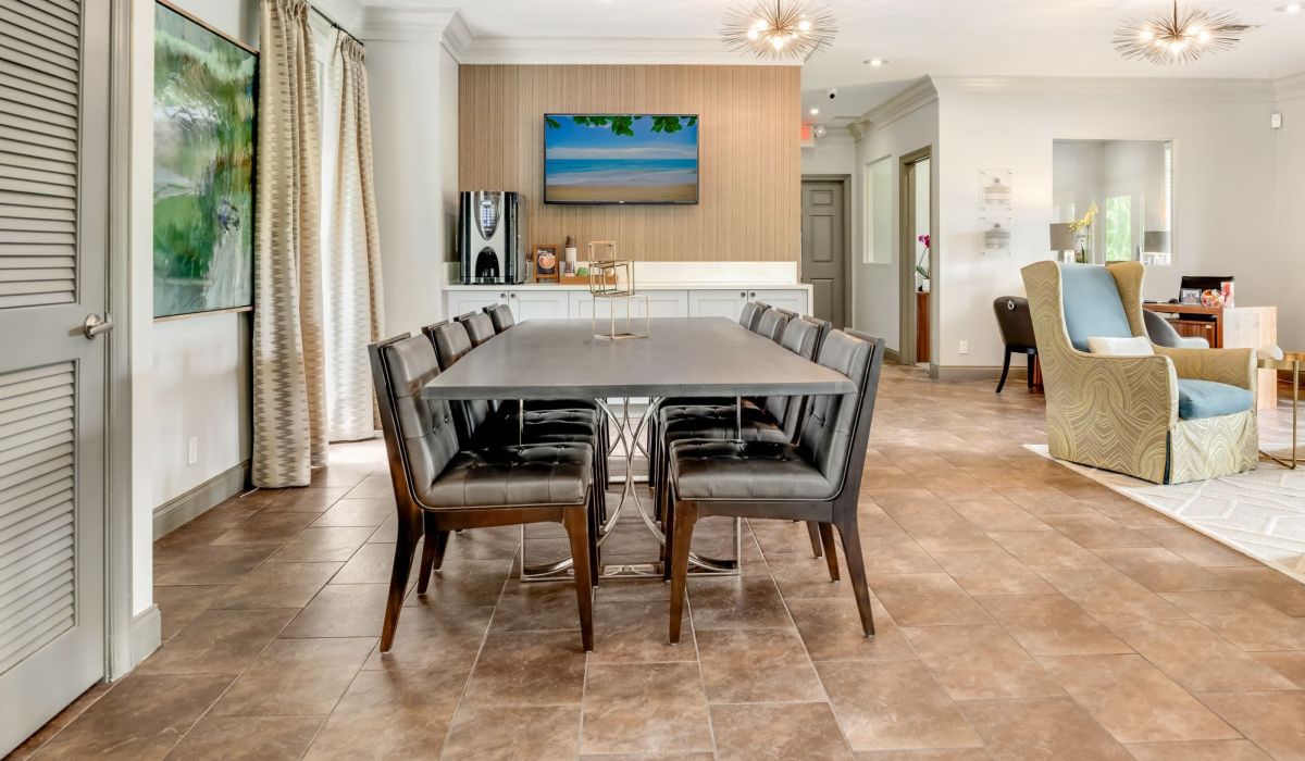 Dining area with seating arrangement at Mizner Court in Boca Raton, Florida