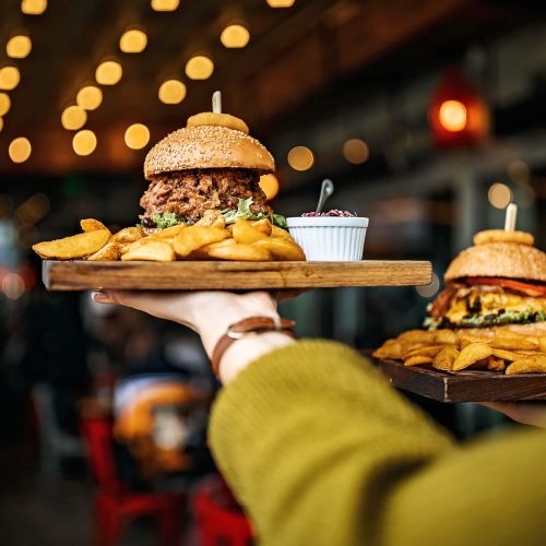 Delicious burgers and fries at restaurant near Balcones Trails in Kyle, Texas