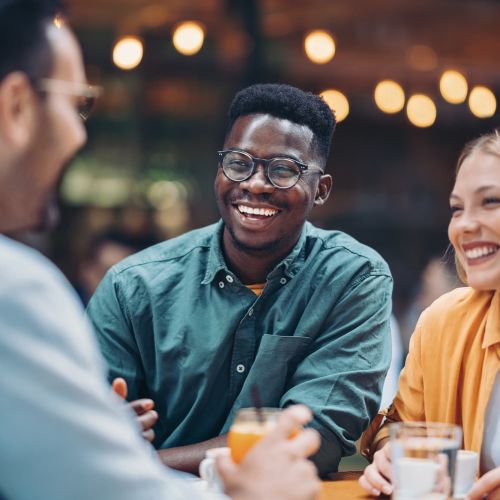Furnished smiling people enjoying drinks at Ivy Park in Baton Rouge, Louisiana