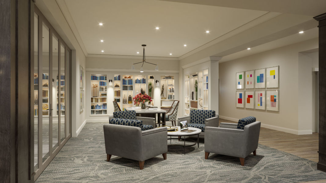 Quiet meeting corner with several chairs arranged around a coffee table at Monark Grove Clarkston in Clarkston, Michigan