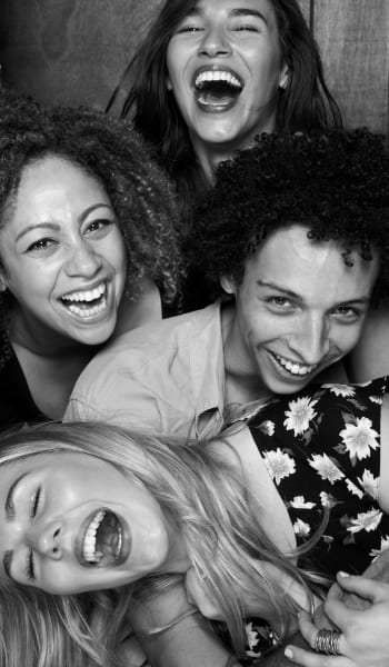 Residents laughing University Lofts in Jonesboro, Arkansas