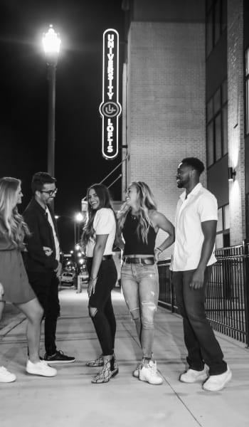 Residents enjoy a night out University Lofts in Jonesboro, Arkansas
