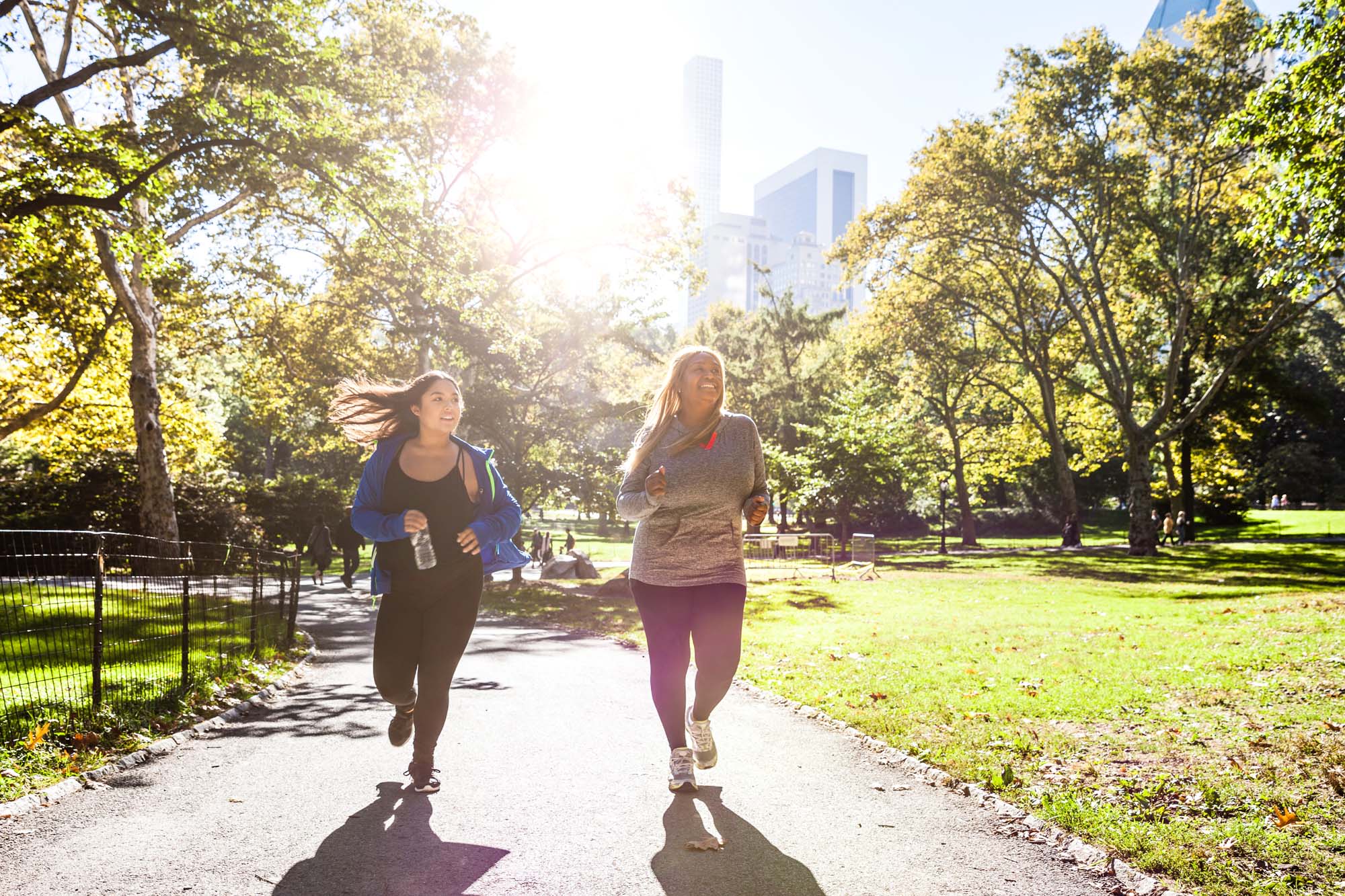 Residents jogging in a park near Camelot Court in Brighton, Massachusetts