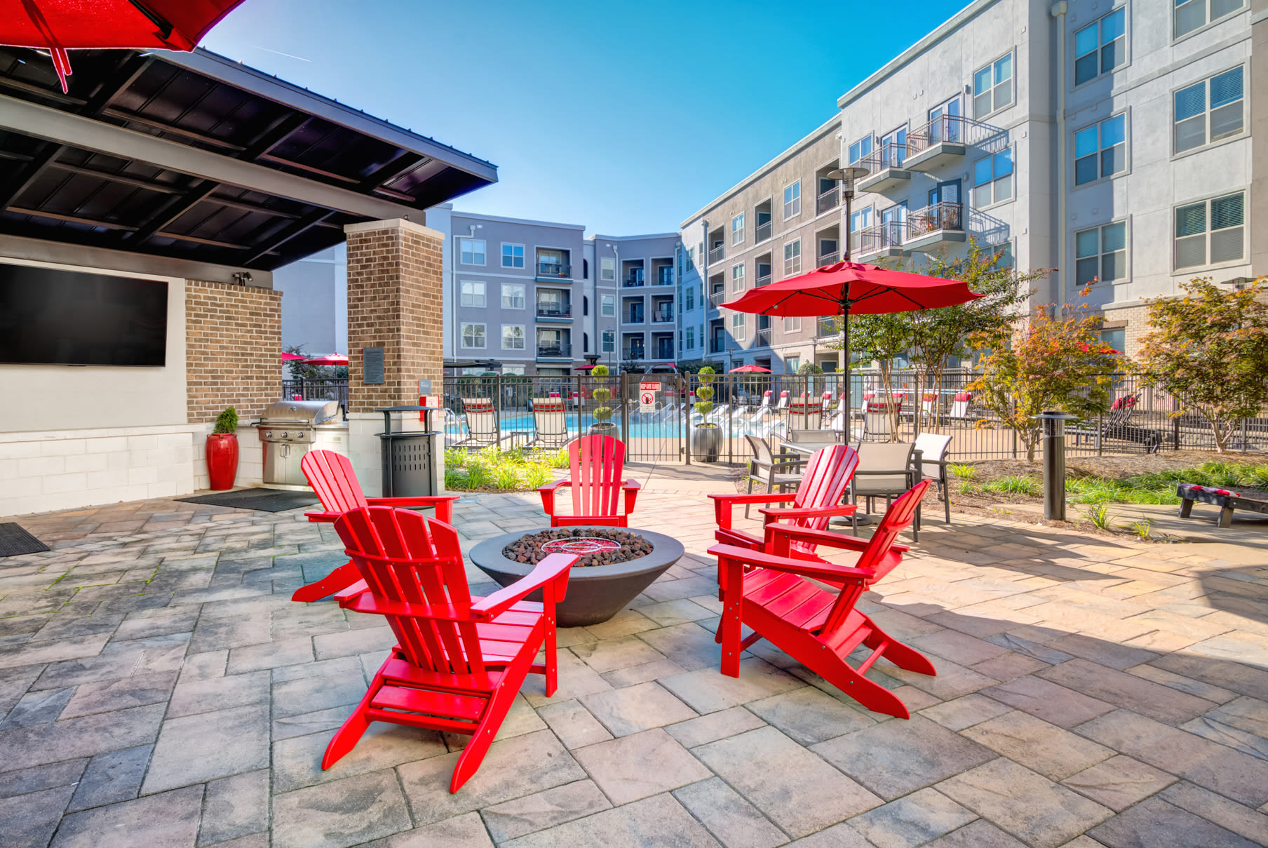 Community seating area with unique red colored chairs at The Carillon in Nashville,Tennessee