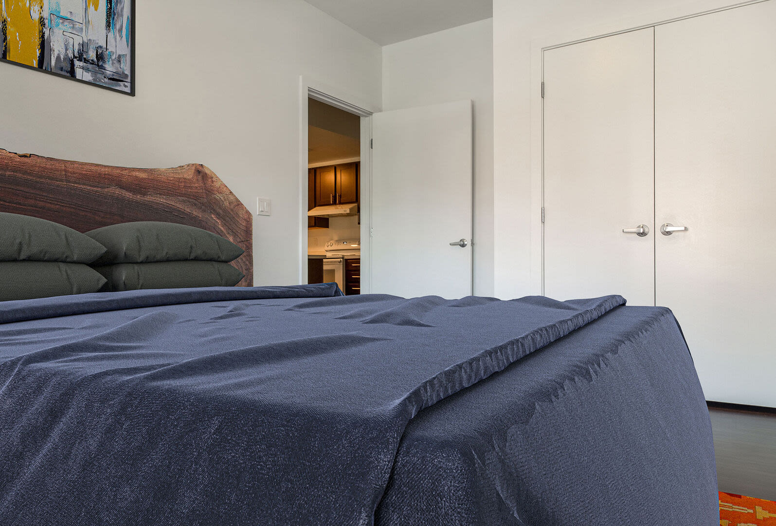 Bedroom with wall art at 61 Heath in Jamaica Plain, Massachusetts