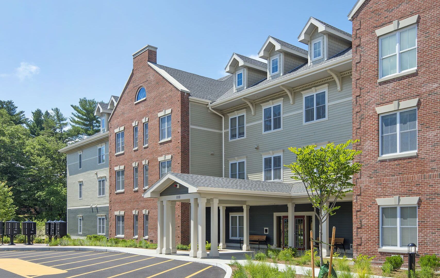Entrance view of the community apartment at Bedford Green Apartments in Bedford, Massachusetts