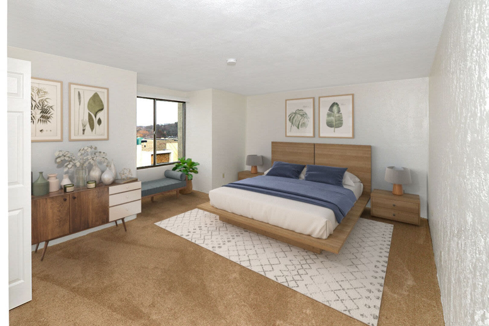 Spacious bedroom with king size bed and large window at Braintree Village in Braintree, Massachusetts