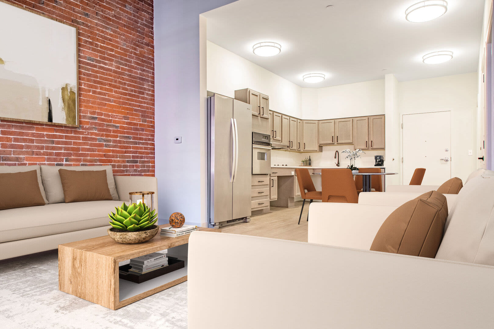 Cozy living room with kitchen view at Mercantile Wharf in Boston, Massachusetts