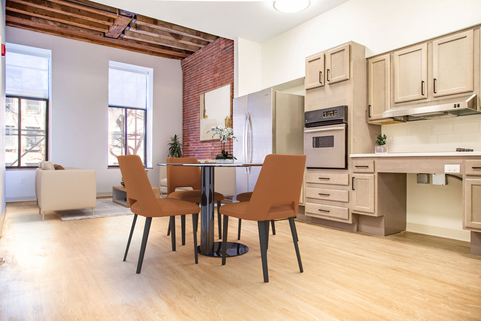 Dining area with kitchen view at Mercantile Wharf in Boston, Massachusetts