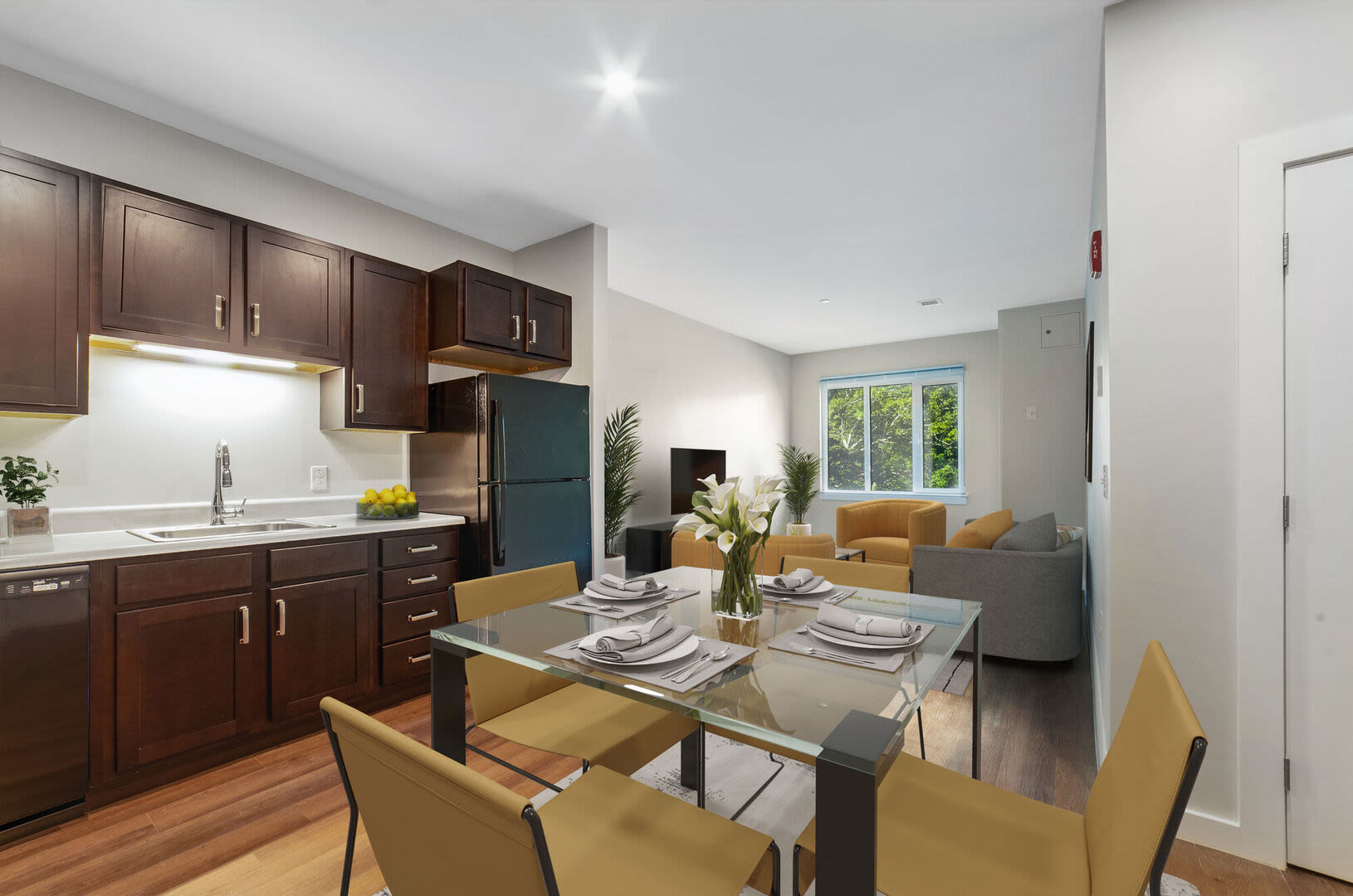 Dining room with easy access to living room at Solara in Tiverton, Rhode Island