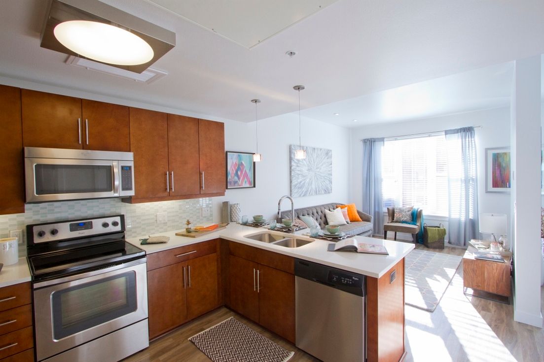 Modern kitchen with stainless steel appliance at One City Block in Denver, Colorado