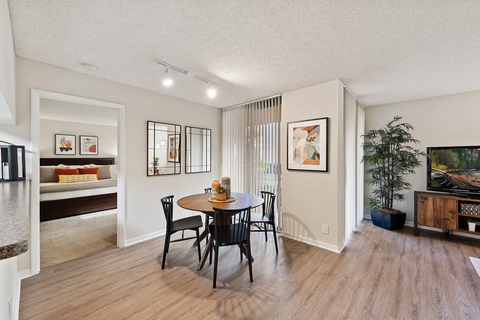 Spacious dining room at New Barn Apartments in Miami Lakes, Florida