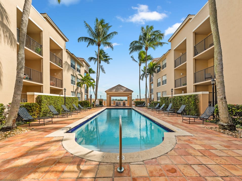 Luxurious pool and gazebo at St. Tropez Apartments in Miami Lakes, Florida