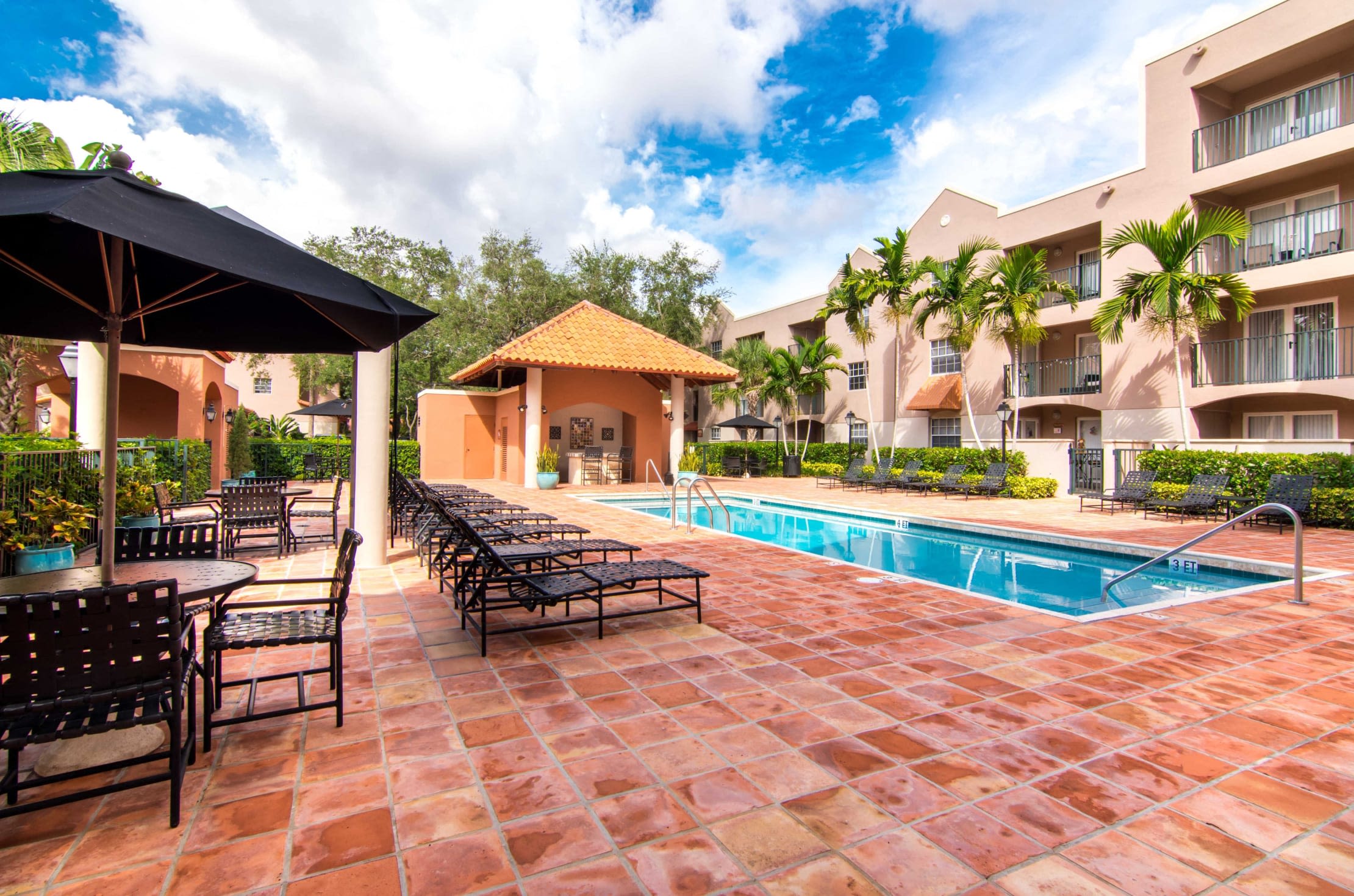 Resort-style swimming pool at Fountain House Apartments in Miami Lakes, Florida