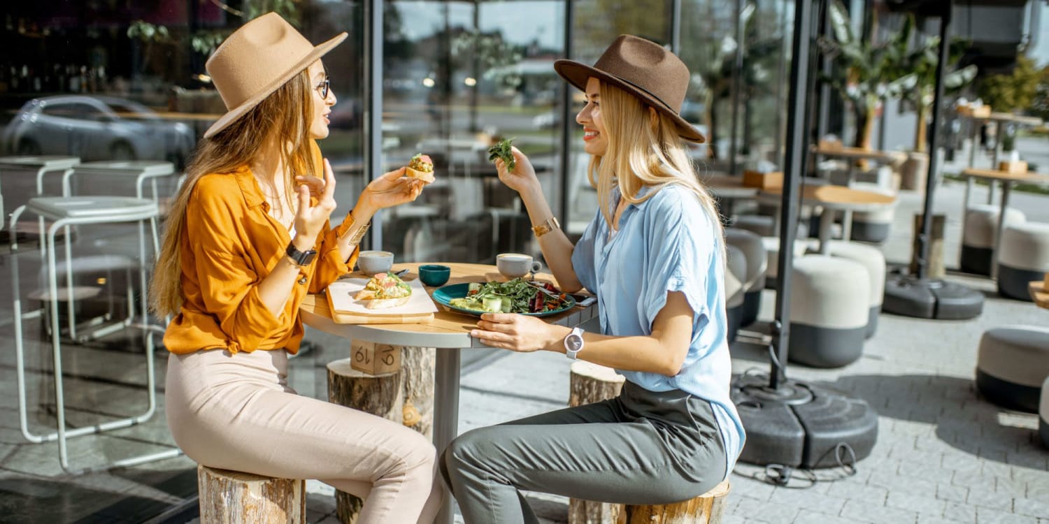 Friends having lunch together near Los Vientos in San Diego, California