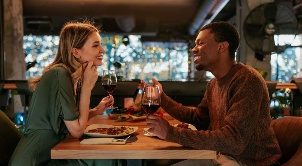 Residents having delicious food at a restaurant near Pine Oaks Apartments in Mesquite, Texas