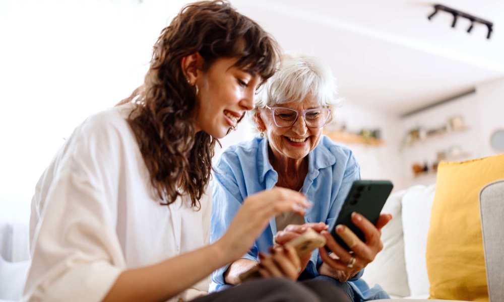 Resident checking rental requirements at Randolph Village Senior Apartments in Silver Spring, Maryland 