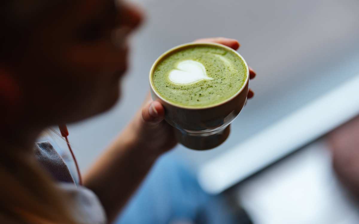 Resident drinking a matcha latte at Stone Village Apartments in Reno, Nevada