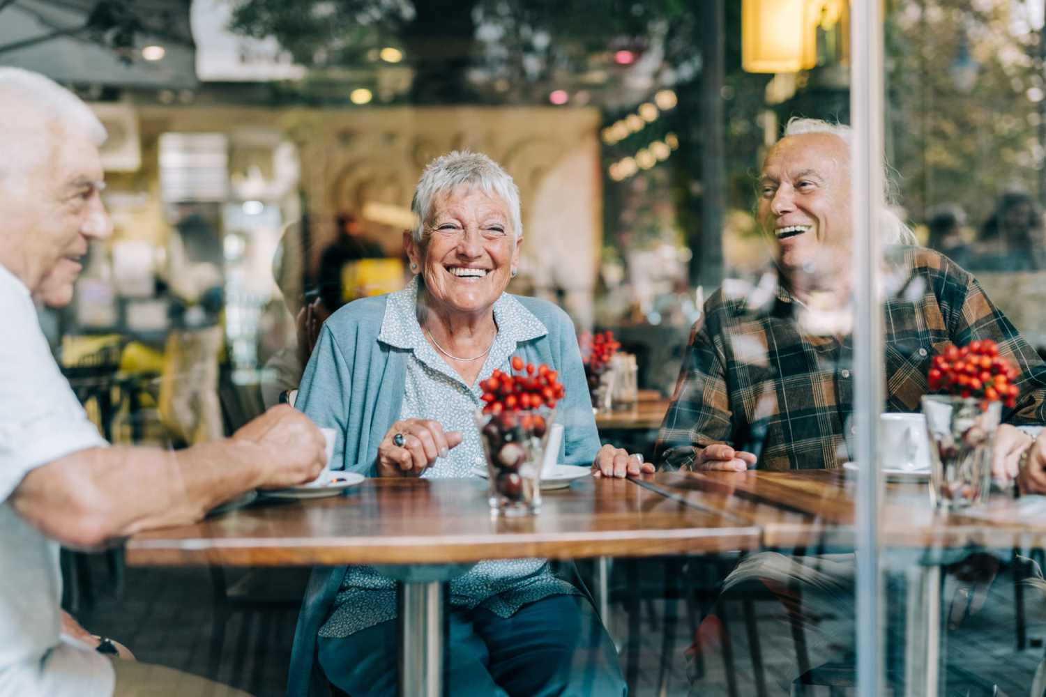Resident having coffee in cafe near Heirloom at Rome in Las Vegas, Nevada
