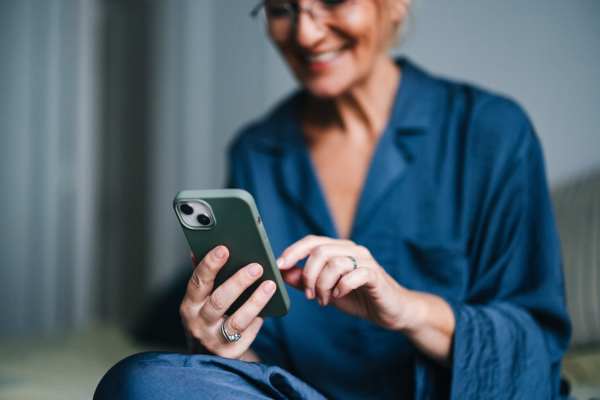 Resident using phone to pay at Sutton in Austin, Texas 