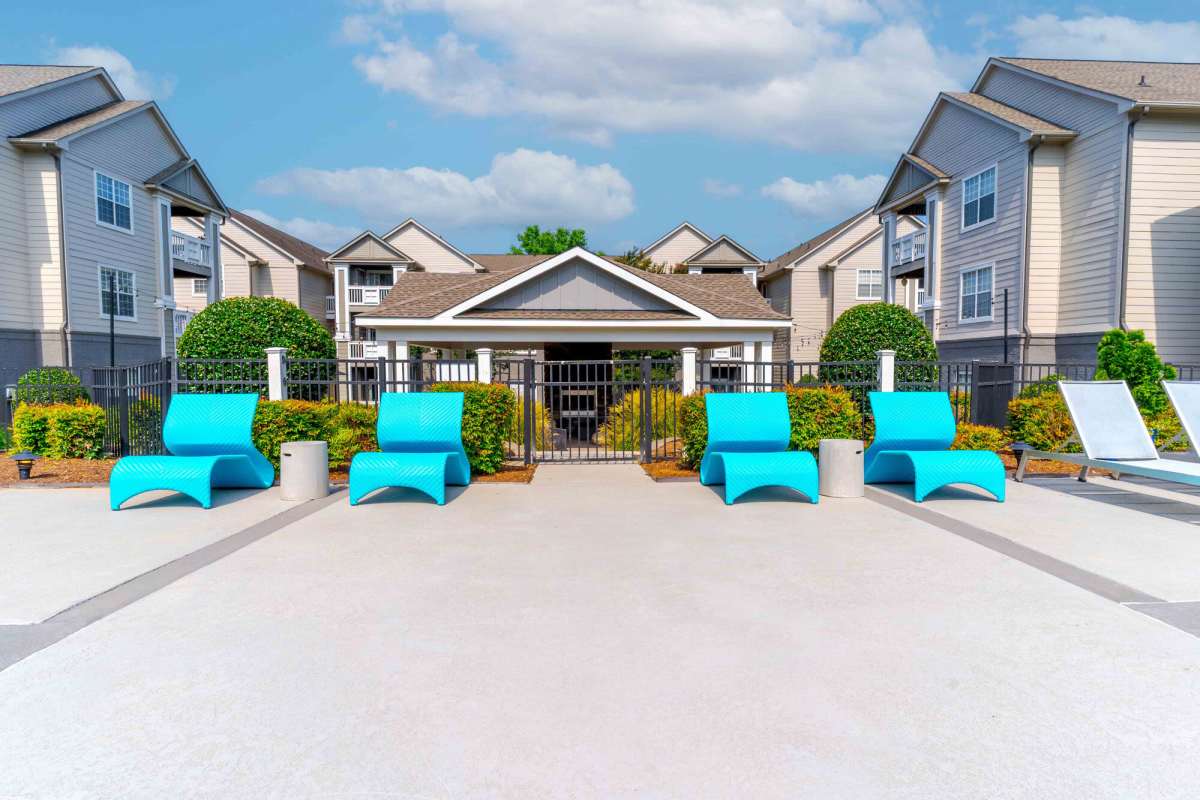 Lounge chairs by the resort-style pool at J 501 Estates in Durham, North Carolina
