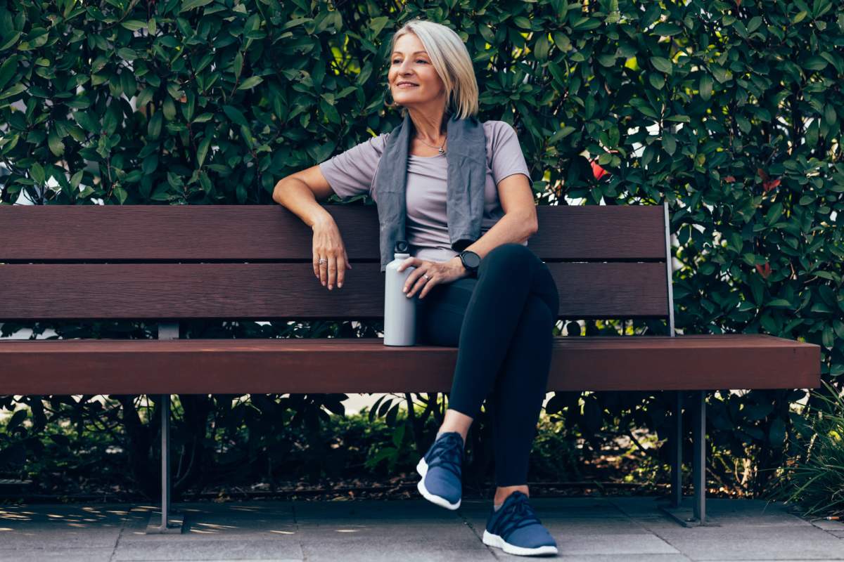 Older resident taking rest after going for a walk near Arbor Pines in Orange, Texas