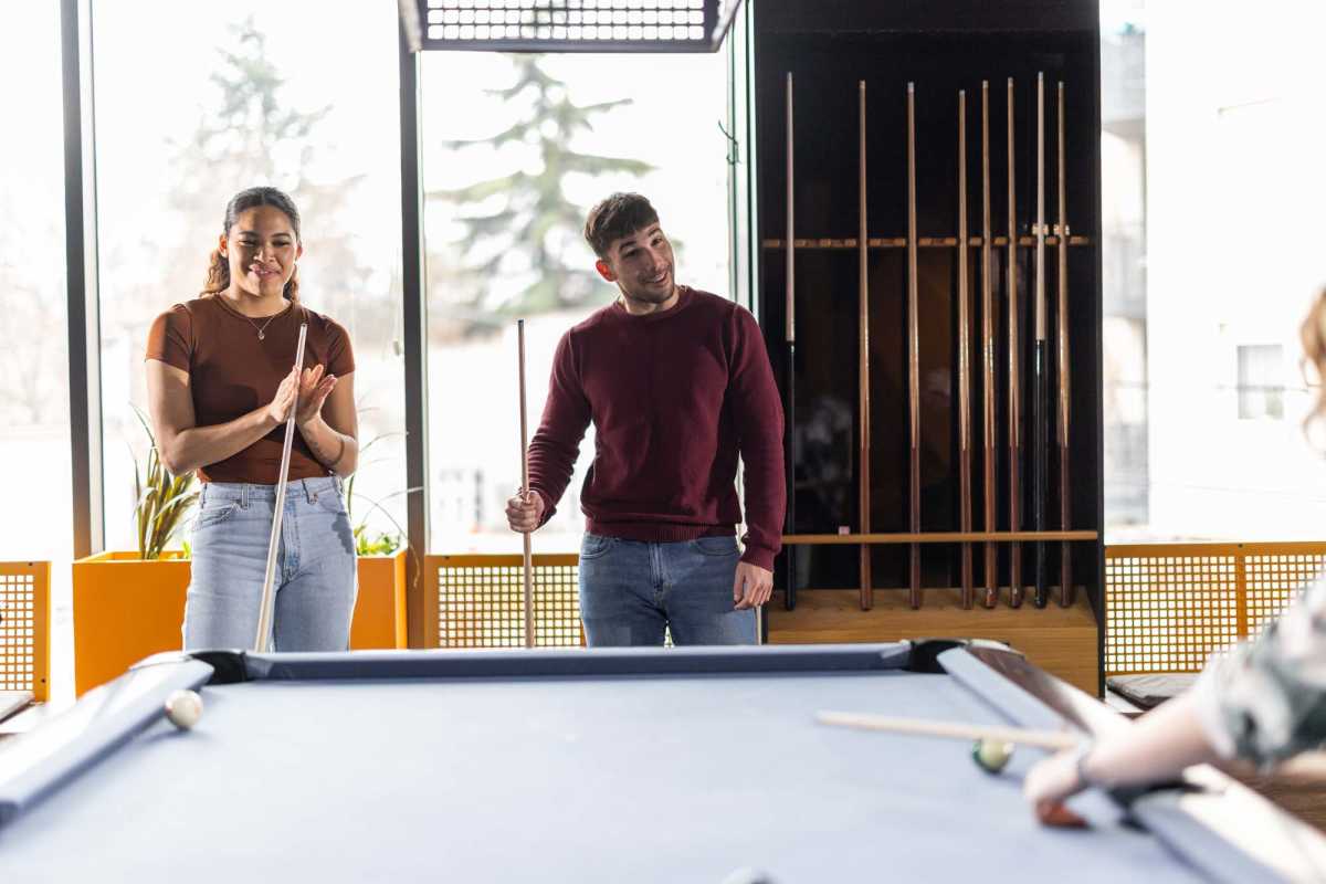 Residents playing in the clubhouse at Cascade Villas in Wichita Falls, Texas