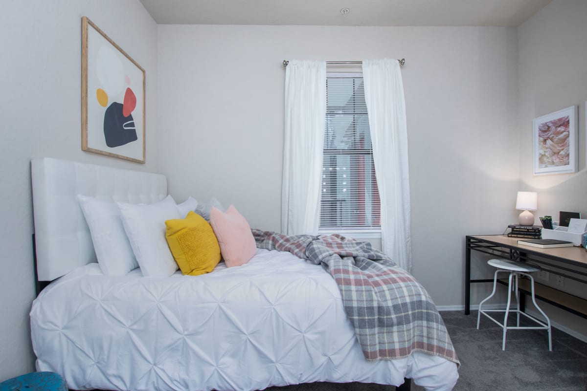 Cozy bedroom with a nice view out of the window at The Ivy in Tampa, Florida