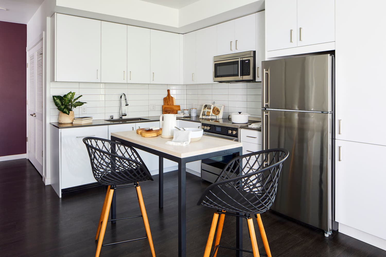 Model Kitchen with Lush White Cabinets at Ambrose in Bremerton, Washington