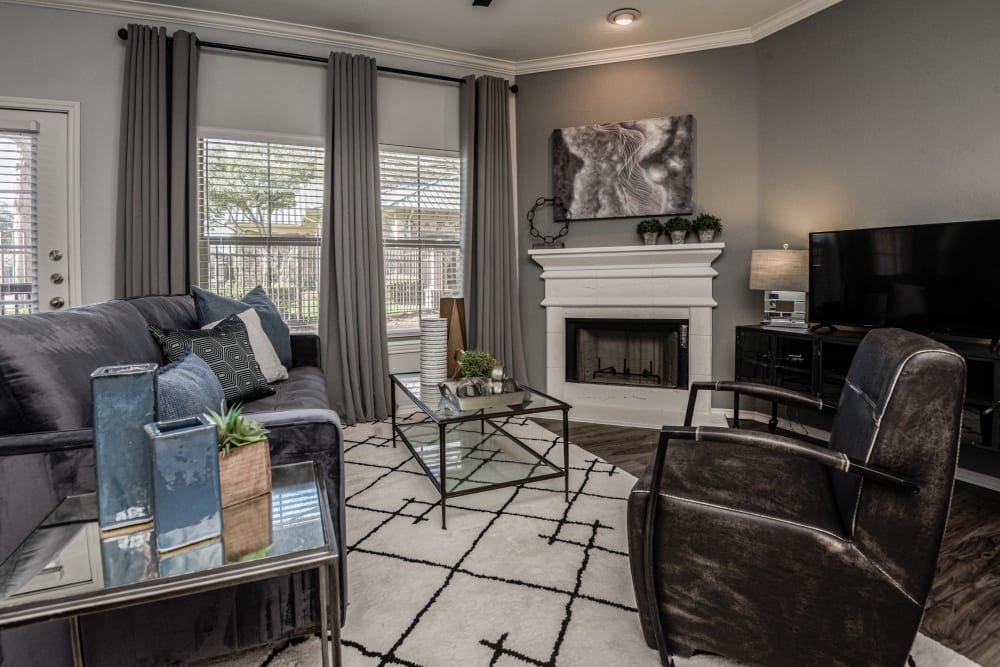 Well-decorated living room in model home at Ranch ThreeOFive in Arlington, Texas