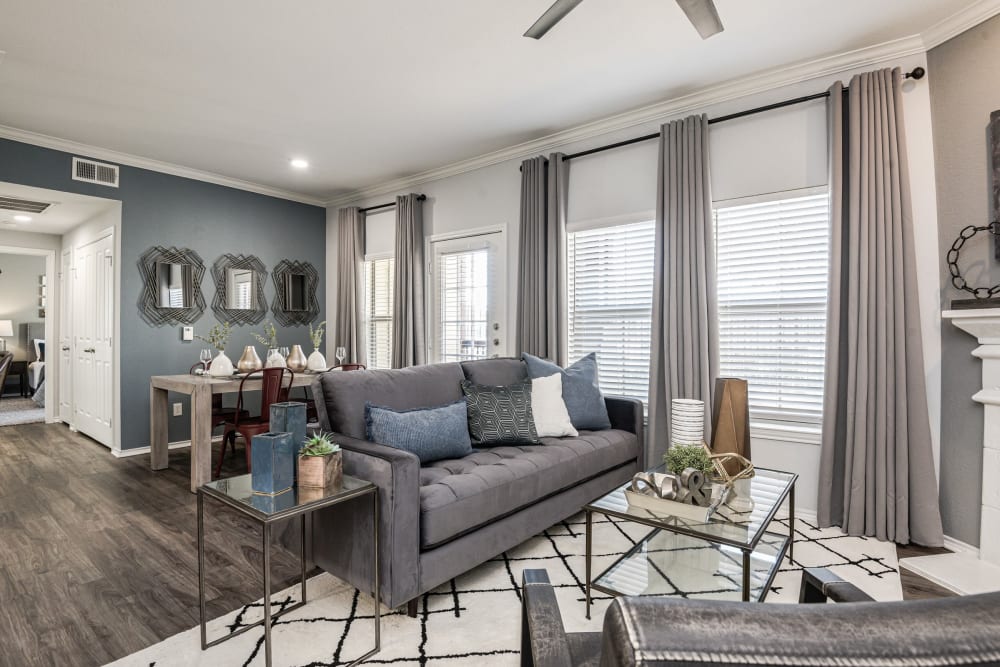 Well-decorated living room in model home at Ranch ThreeOFive in Arlington, Texas