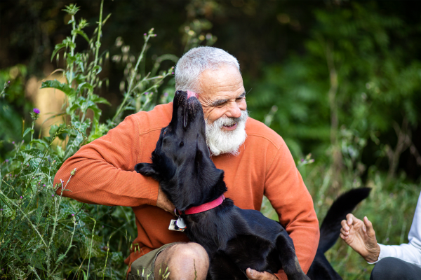A resident and his dog at Mountain View Retirement Village in Tucson, Arizona.
