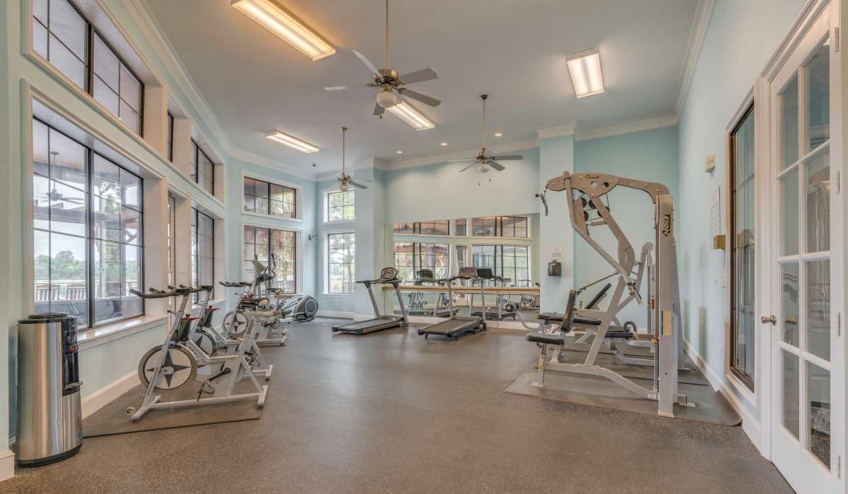 Well-equipped fitness center with various exercise equipment at Edgewater at Klein in Spring, Texas