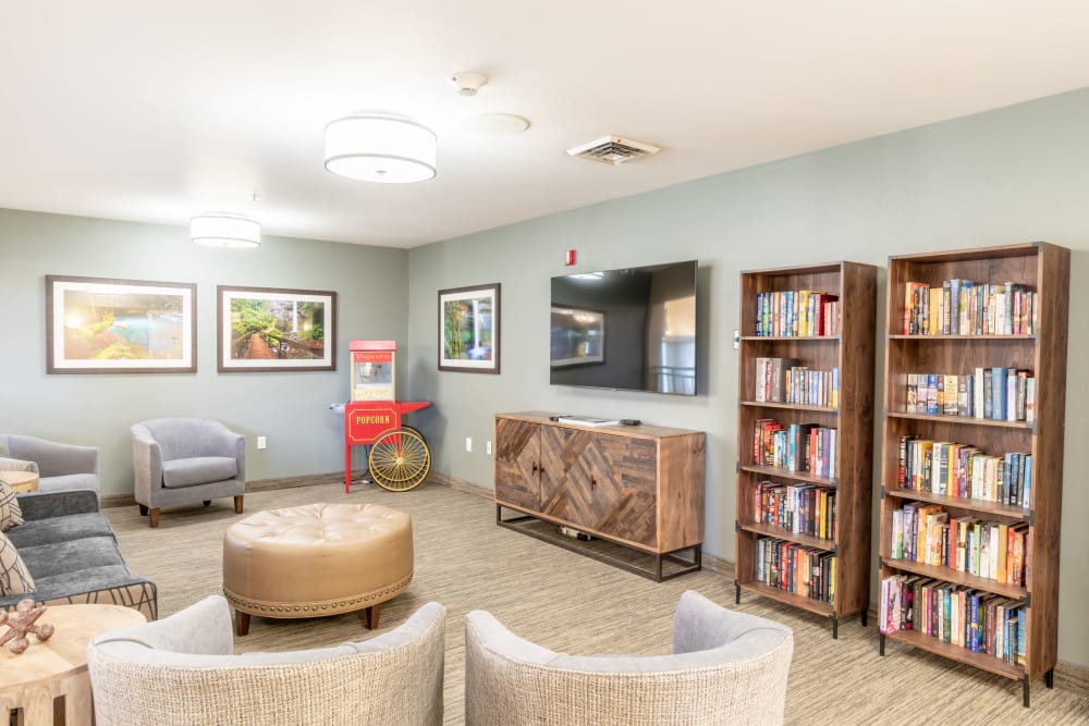 Lounge area with popcorn machine at Heron Pointe Senior Living in Monmouth, Oregon