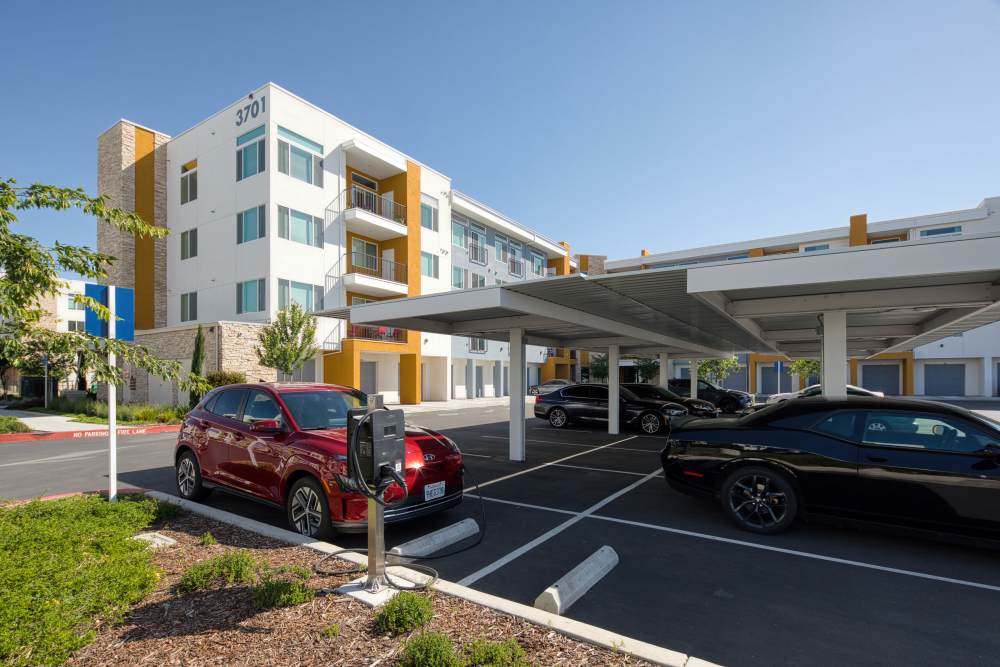 Carport facility with electric charging point at Zeta Luxury Apartments in Sacramento, California