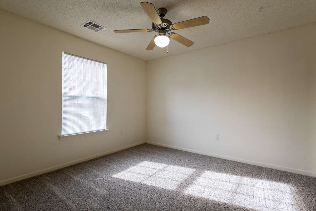 Unfurnished room with natural sunlight falling at Adobe Ranch in Borger, Texas